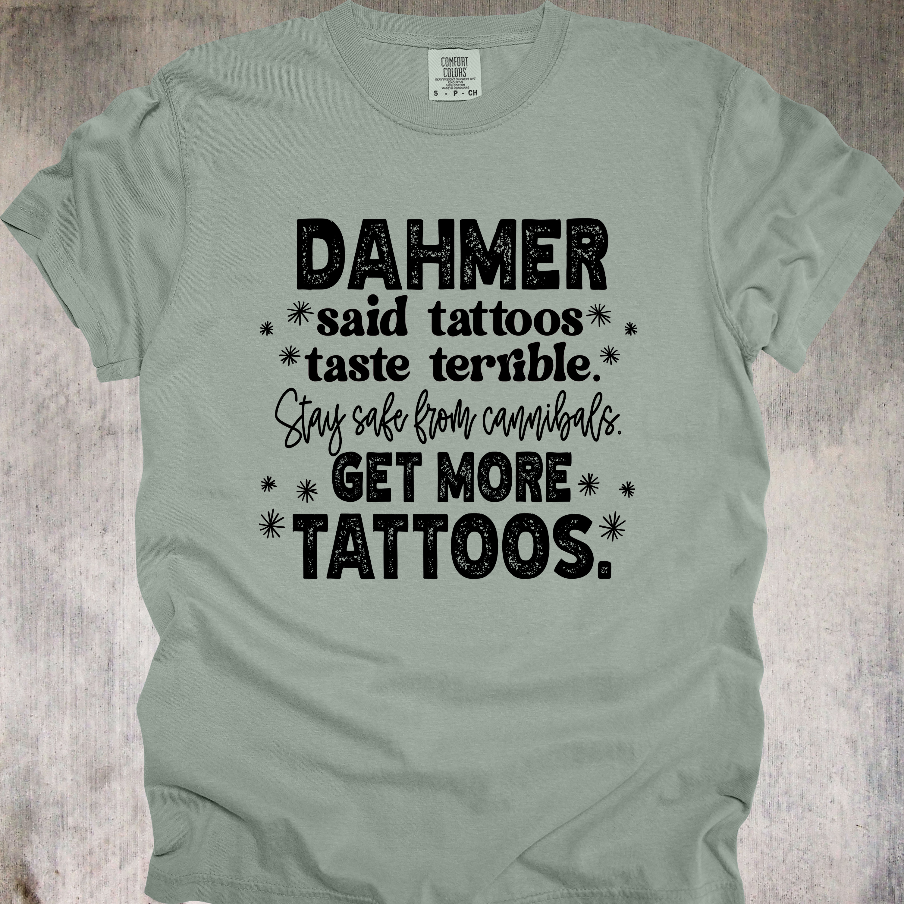'Dahmer said tattoos taste terrible. Stay safe from canibals. Get more tattoos.' - Unisex Tee - Tattoos: Cannibal-Repellent!