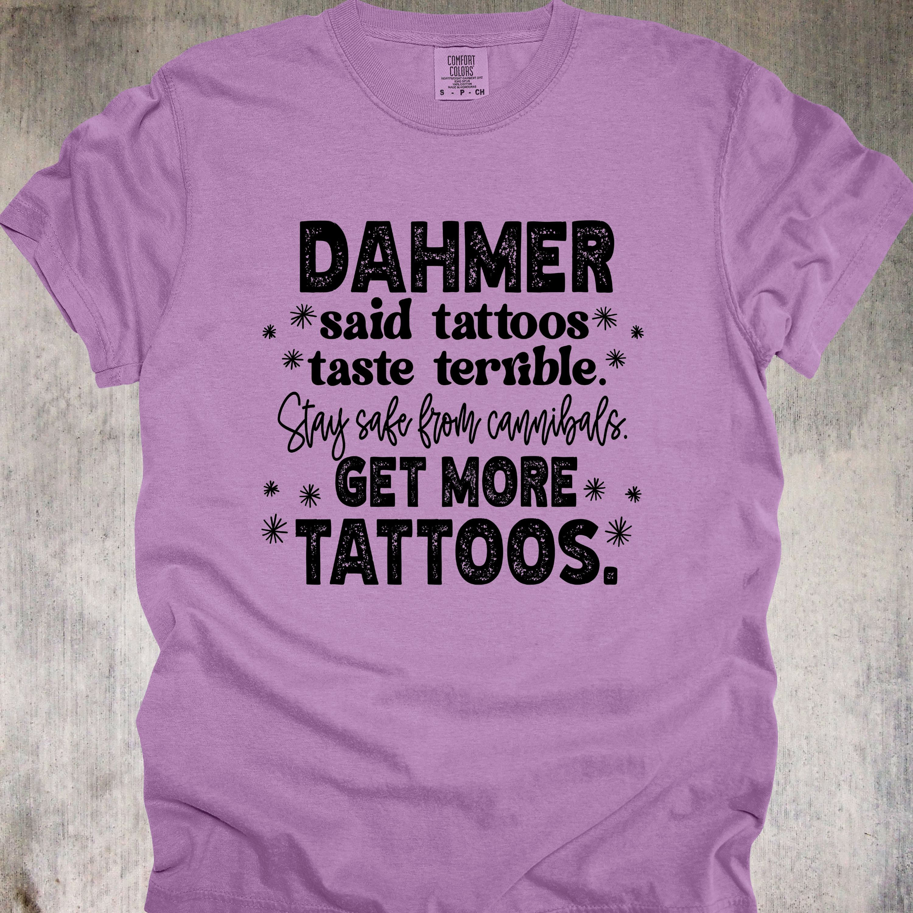 'Dahmer said tattoos taste terrible. Stay safe from canibals. Get more tattoos.' - Unisex Tee - Tattoos: Cannibal-Repellent!