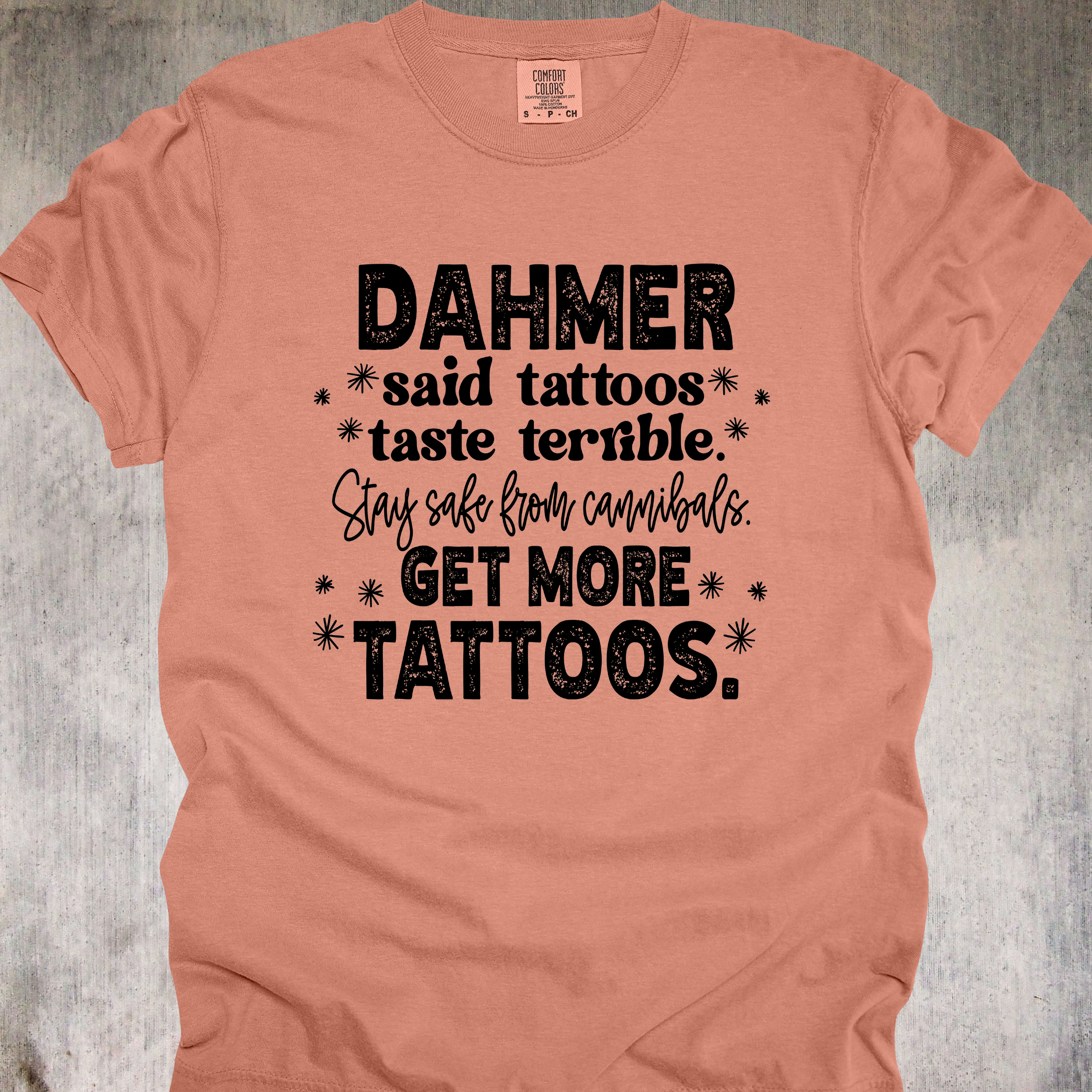 'Dahmer said tattoos taste terrible. Stay safe from canibals. Get more tattoos.' - Unisex Tee - Tattoos: Cannibal-Repellent!