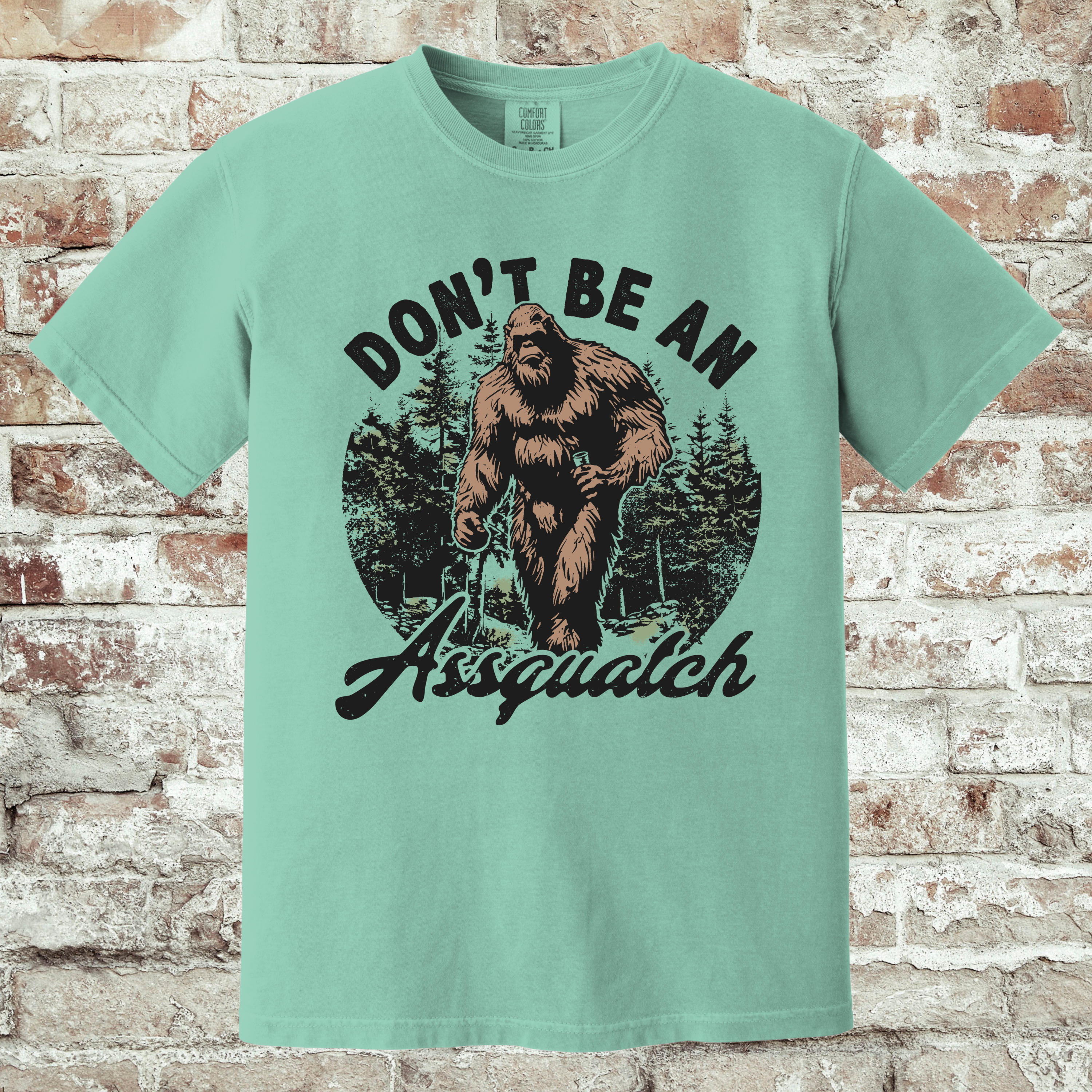 'DON'T BE AN ASSQUATCH' - Unisex T-Shirt - Be A Decent Human