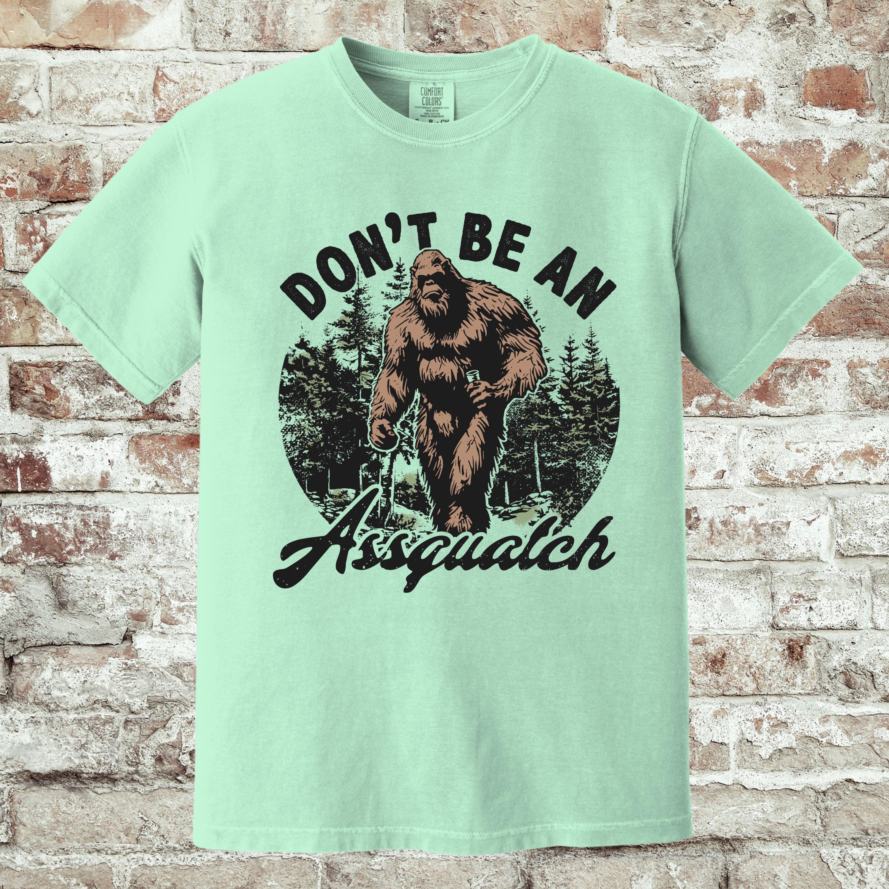 'DON'T BE AN ASSQUATCH' - Unisex T-Shirt - Be A Decent Human