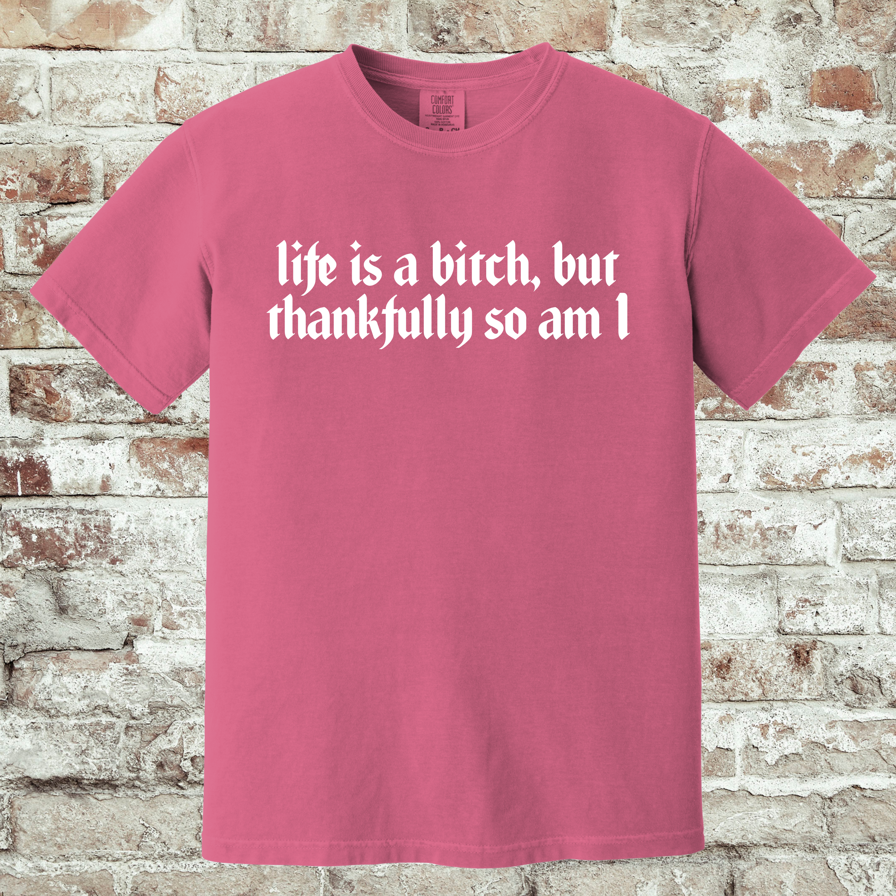 'LIFE IS A BITCH, BUT THANKFULLY SO AM I' -Unisex T-Shirt