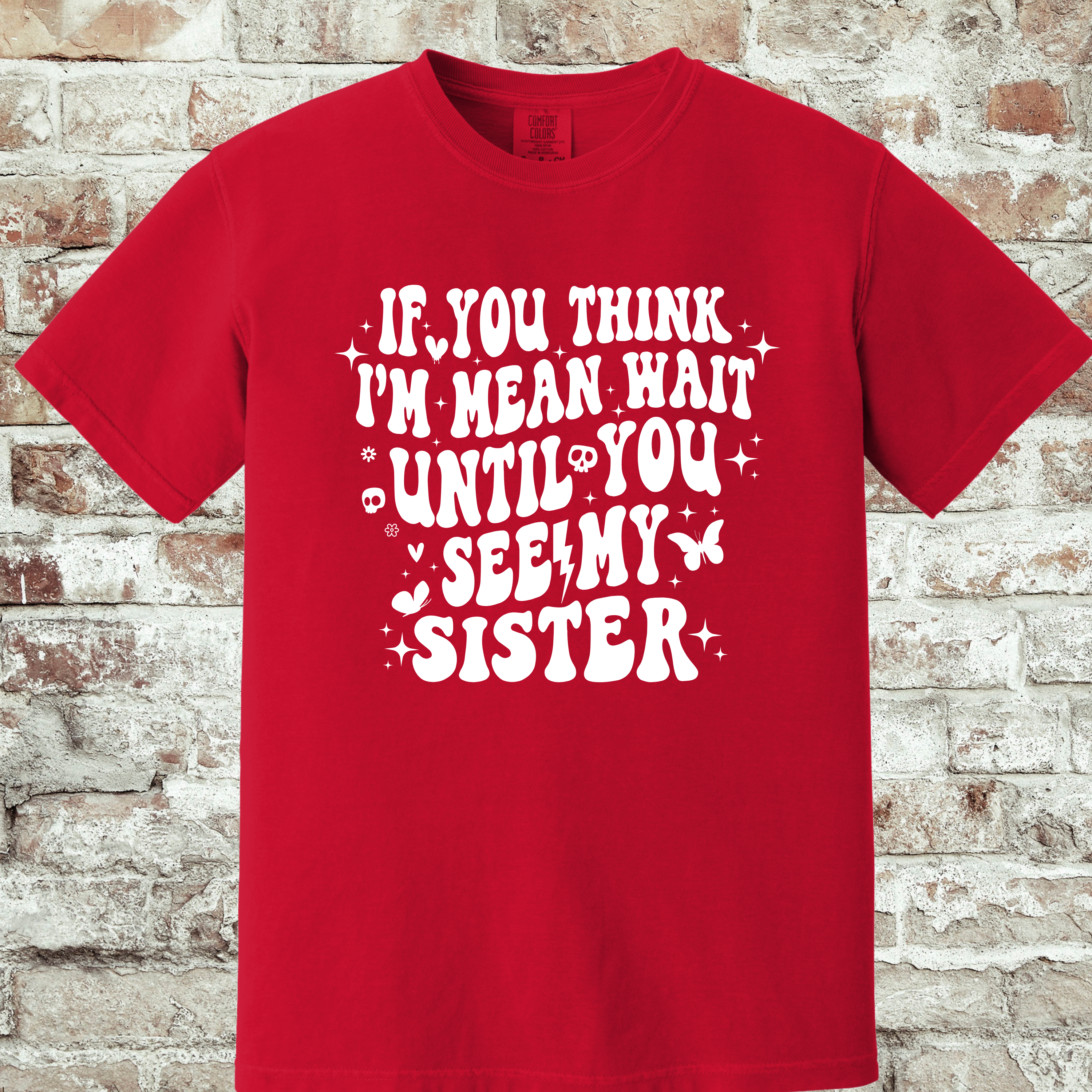 'IF YOU THINK I'M MEAN WAIT TIL YOU SEE MY SISTER' - Unisex T-Shirt