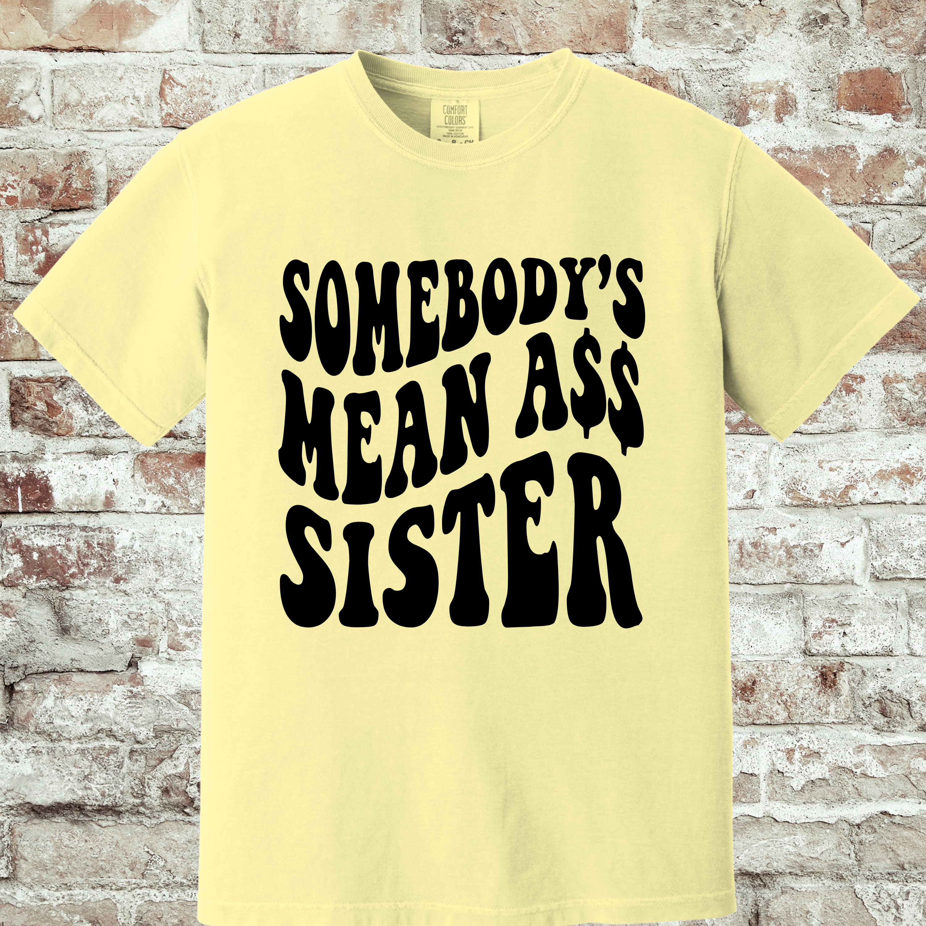 'SOMEBODY'S MEAN A$$ SISTER' - Unisex T-Shirt