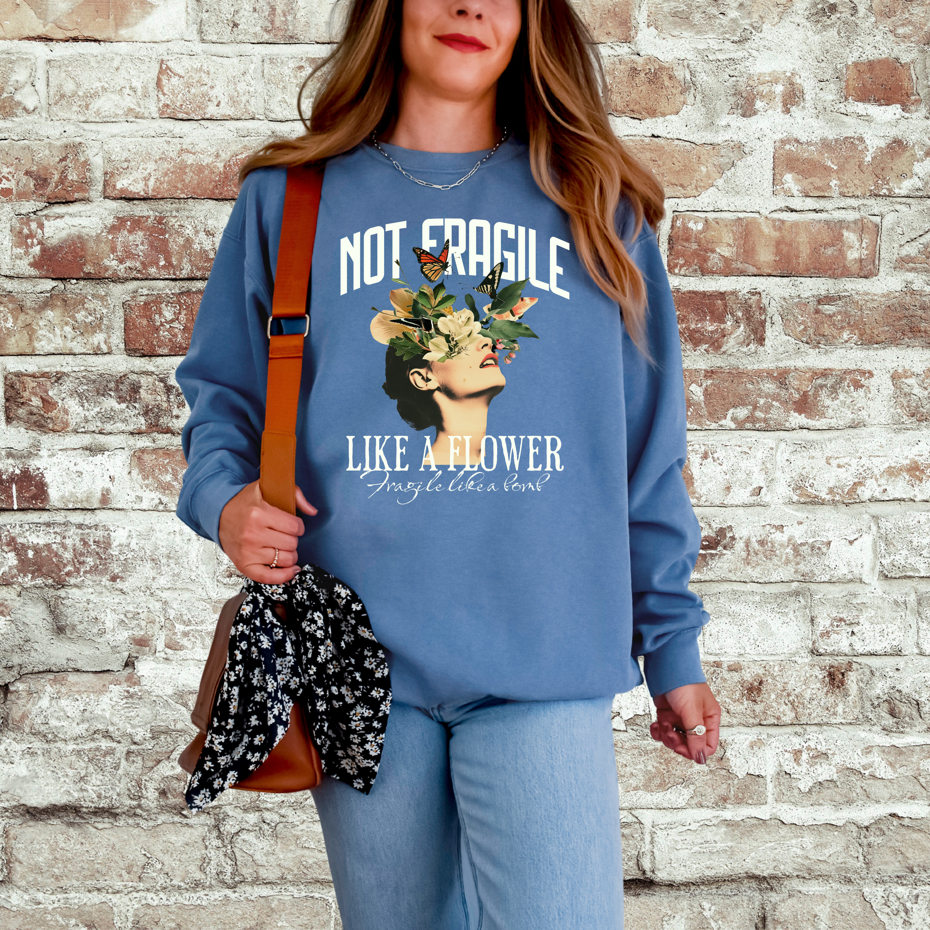'NOT FRAGILE LIKE A FLOWER, FRAGILE LIKE A BOMB.' - Unisex Sweatshirt