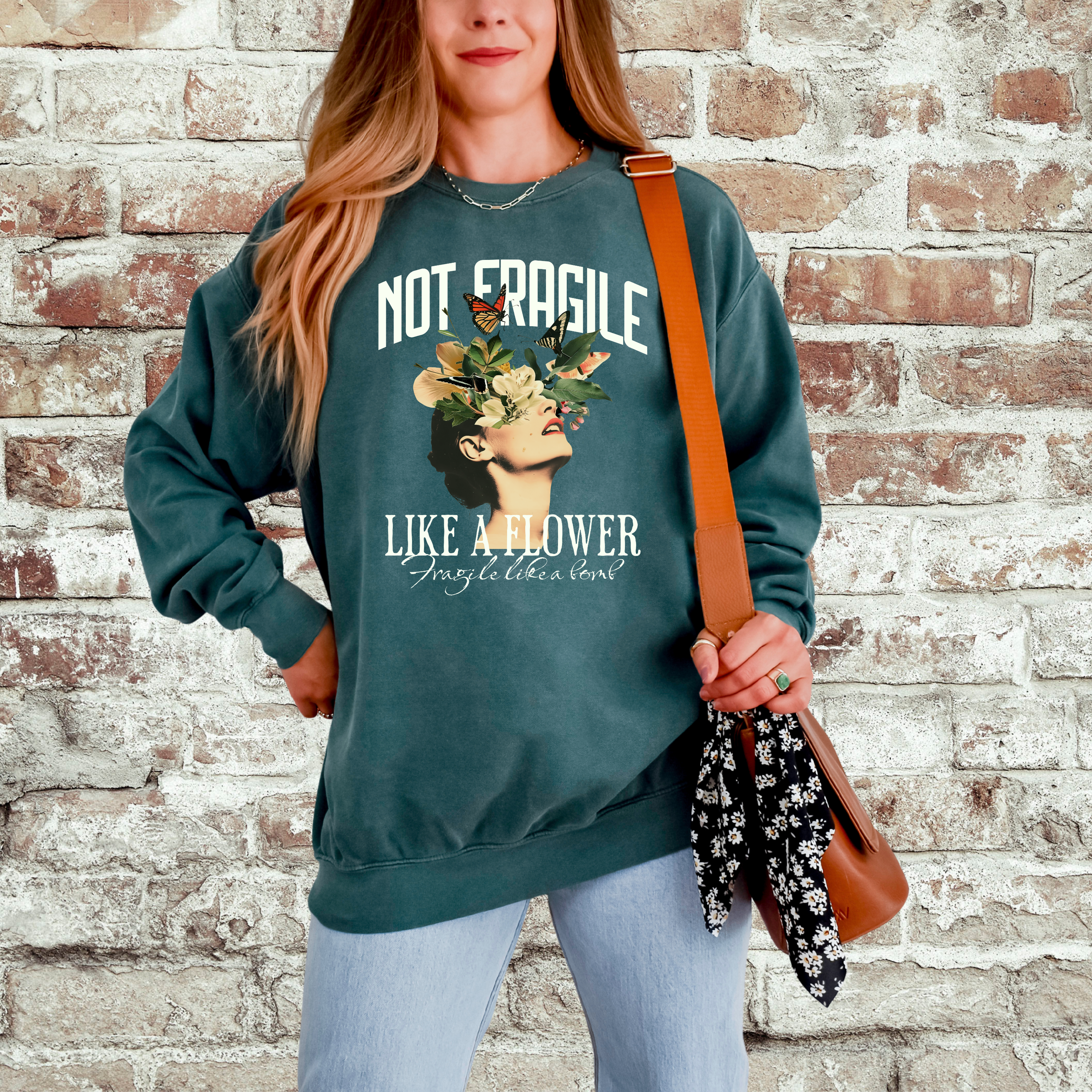 'NOT FRAGILE LIKE A FLOWER, FRAGILE LIKE A BOMB.' - Unisex Sweatshirt