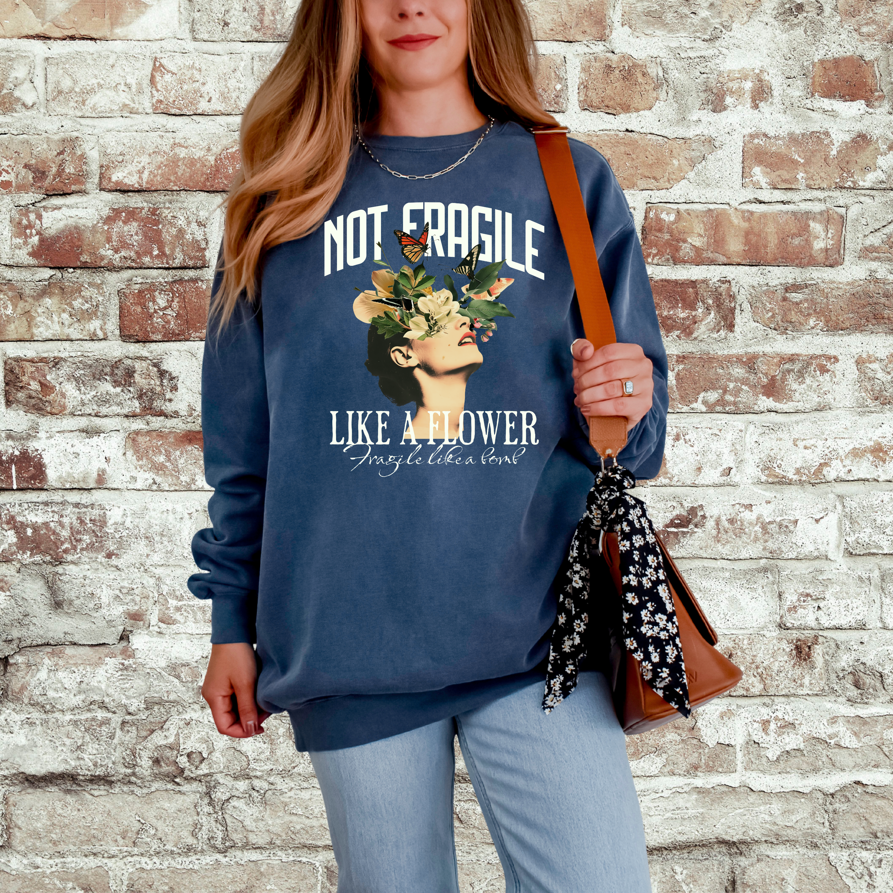 'NOT FRAGILE LIKE A FLOWER, FRAGILE LIKE A BOMB.' - Unisex Sweatshirt