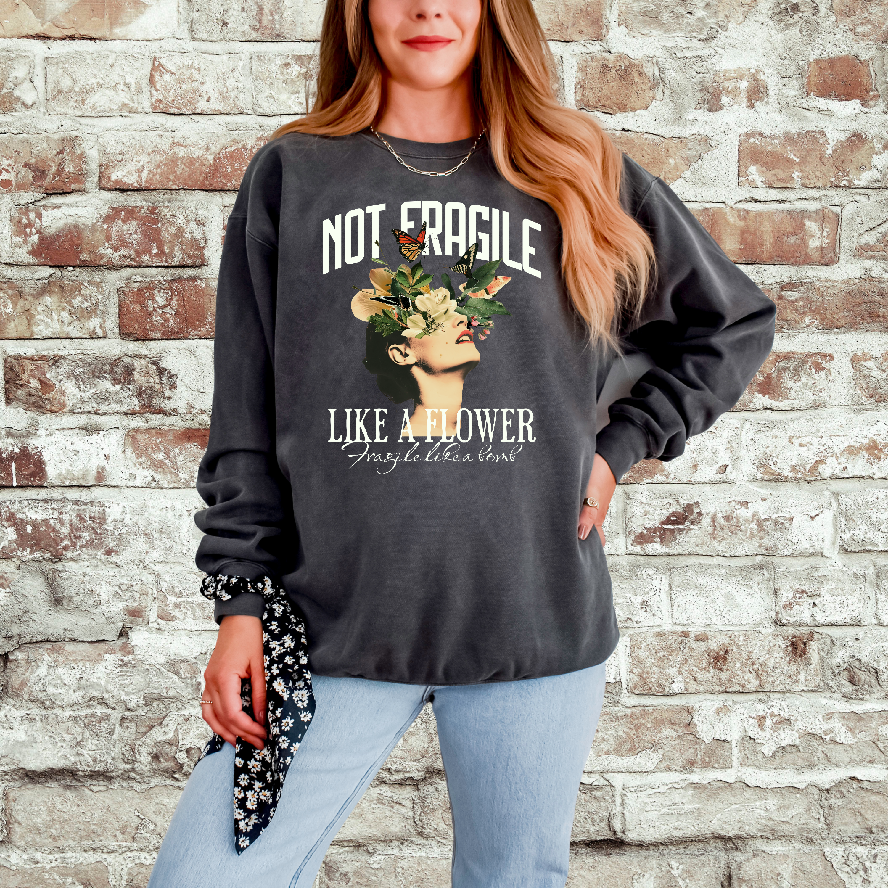 'NOT FRAGILE LIKE A FLOWER, FRAGILE LIKE A BOMB.' - Unisex Sweatshirt