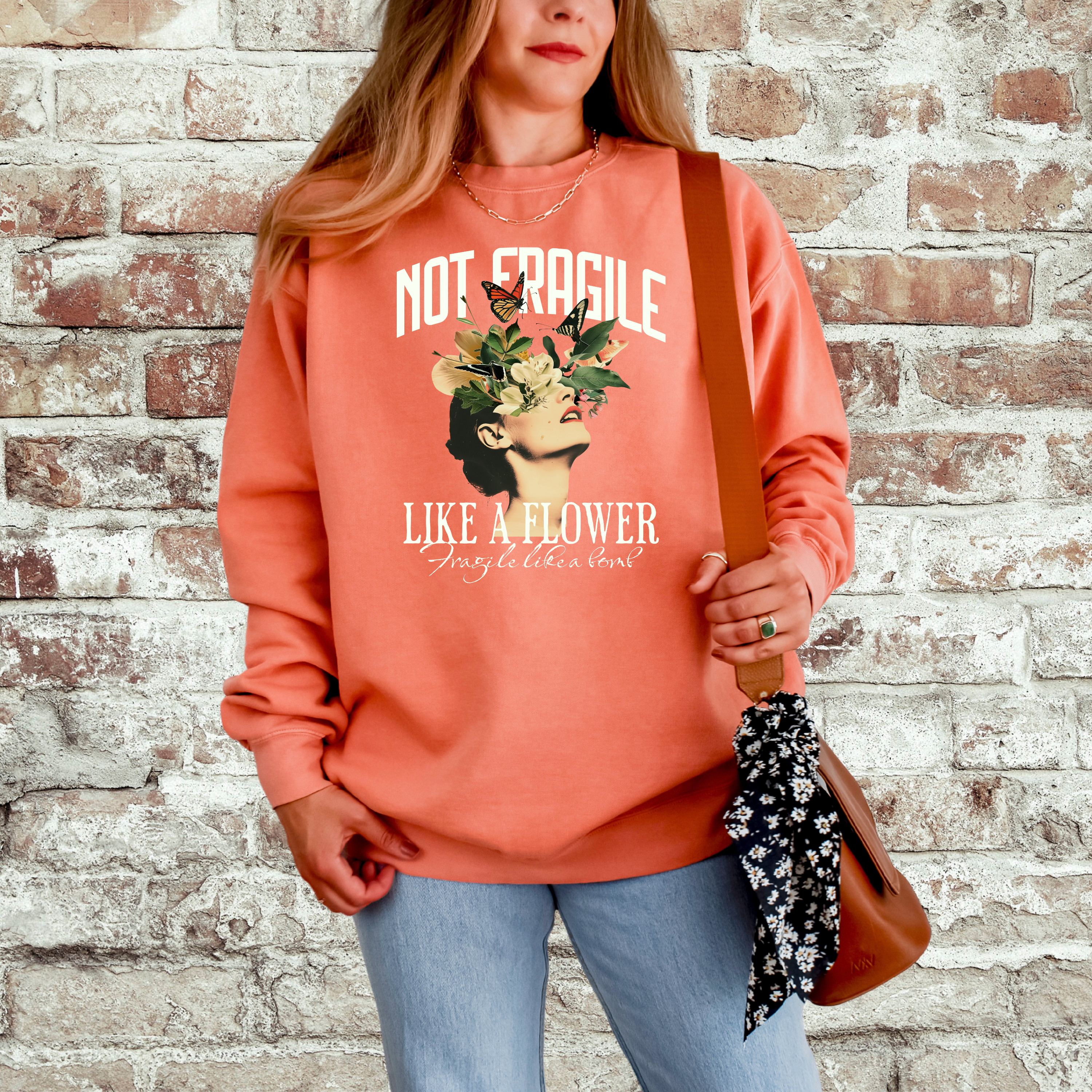 'NOT FRAGILE LIKE A FLOWER, FRAGILE LIKE A BOMB.' - Unisex Sweatshirt