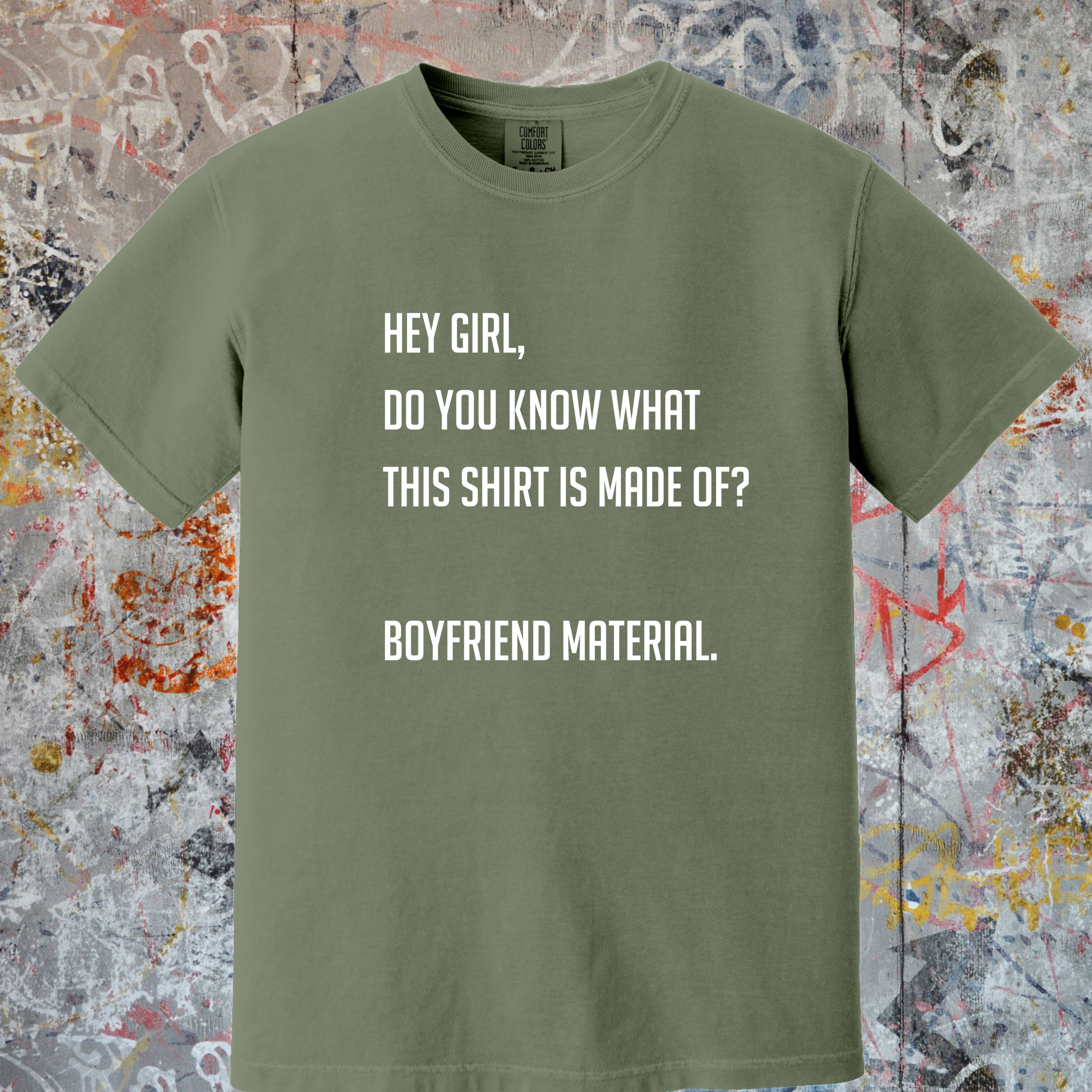 'HEY GIRL, DO YOU KNOW WHAT THIS T-SHIRT IS MADE OF? BOYFRIEND MATERIAL' - Unisex T-Shirt