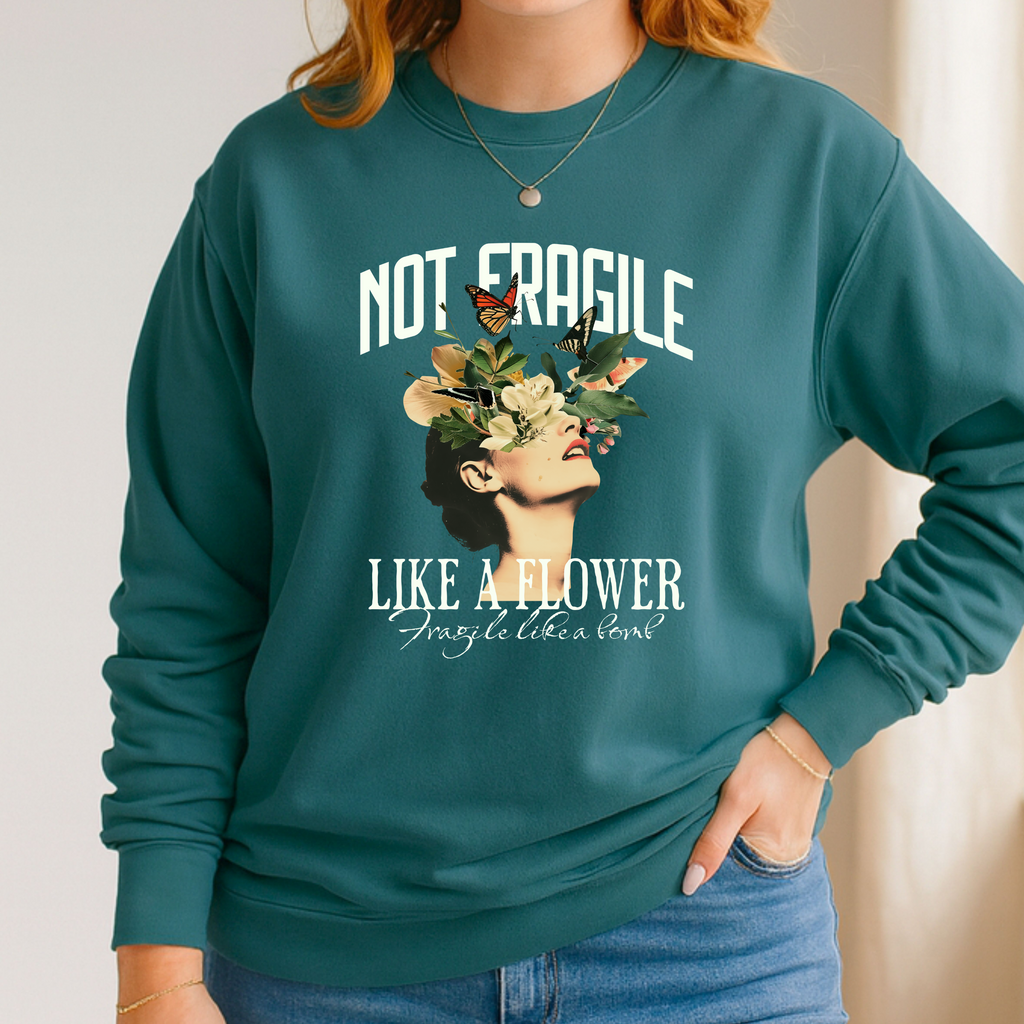 'NOT FRAGILE LIKE A FLOWER, FRAGILE LIKE A BOMB' - Unisex Sweatshirt