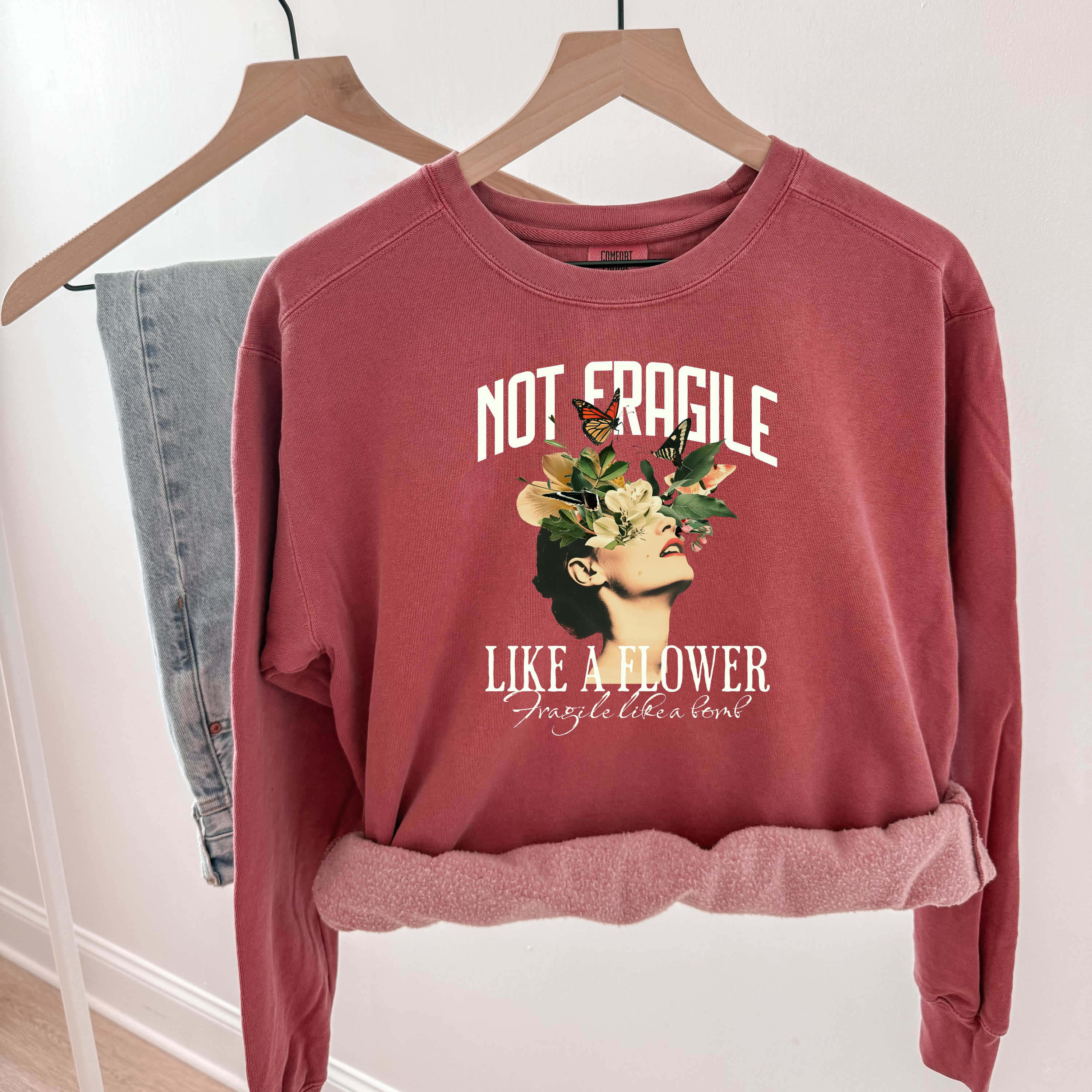 'NOT FRAGILE LIKE A FLOWER, FRAGILE LIKE A BOMB' -  Unisex Comfort Colors Sweatshirt